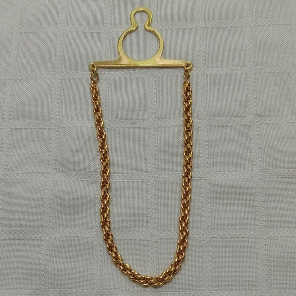 Vintage gold-colored pocket button chain